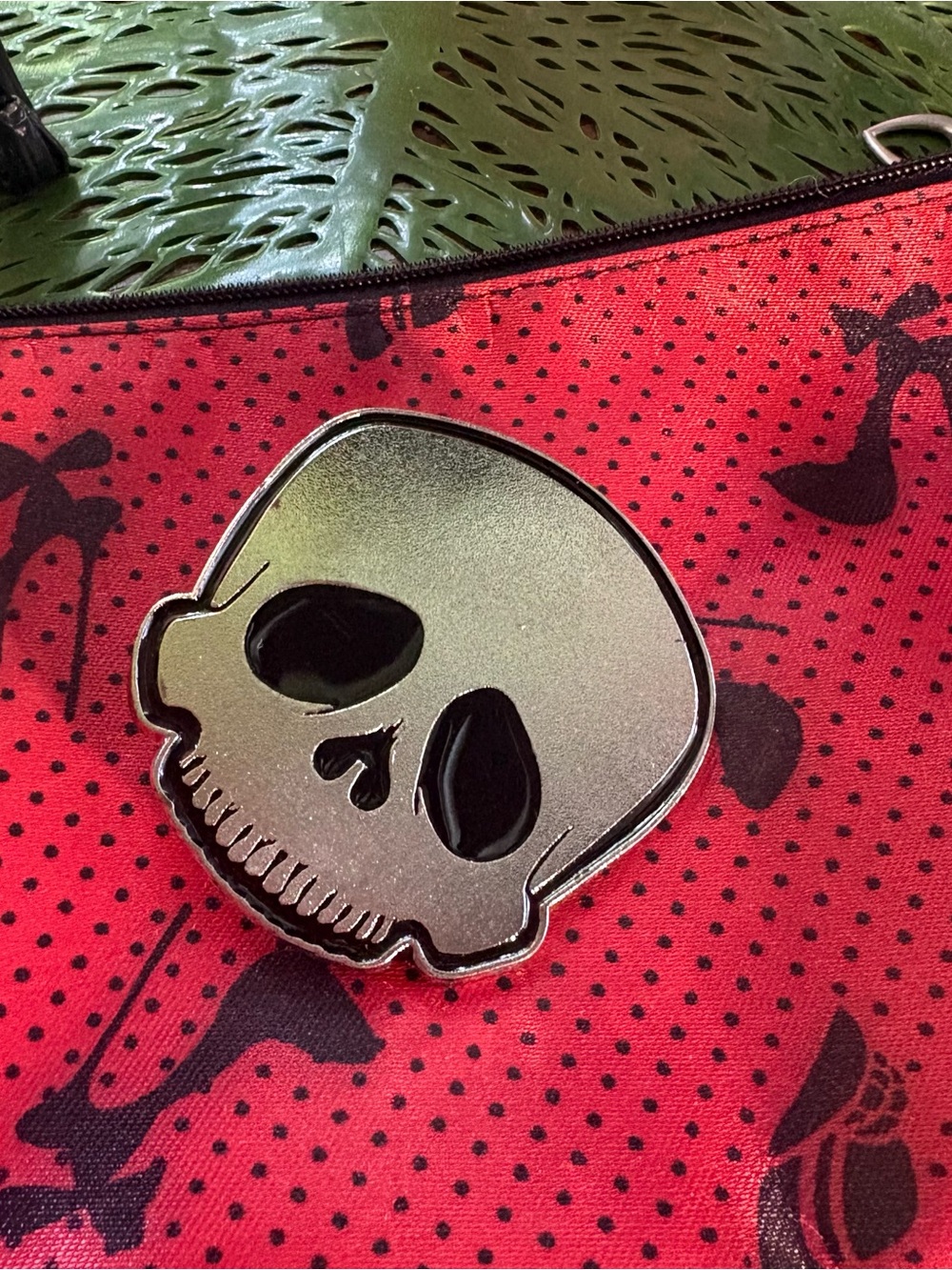 Metallic Skull Pin on Red Polka Dot Pouch